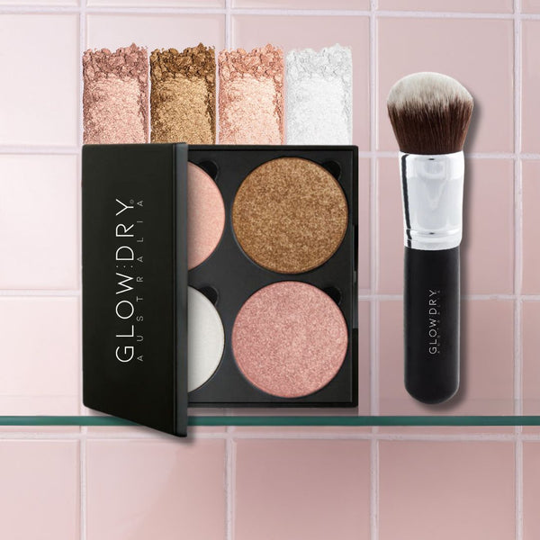 Illuminating palette with four shimmering colors and a brush from GlowDry Australia on a tiled background