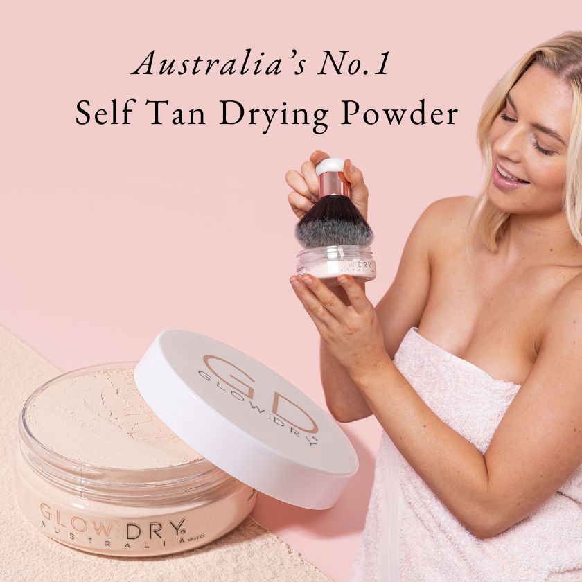 Woman holding a self-tan product with 'Australia's No.1 Self Tan Drying Powder' text on a pink background