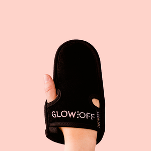 exfoliating mitt on hand